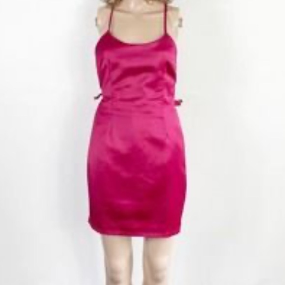 Revolve About Us pink dress with cross cross in the back